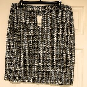 NWT: Banana Republic knee length skirt with hidden back zipper, size 14.